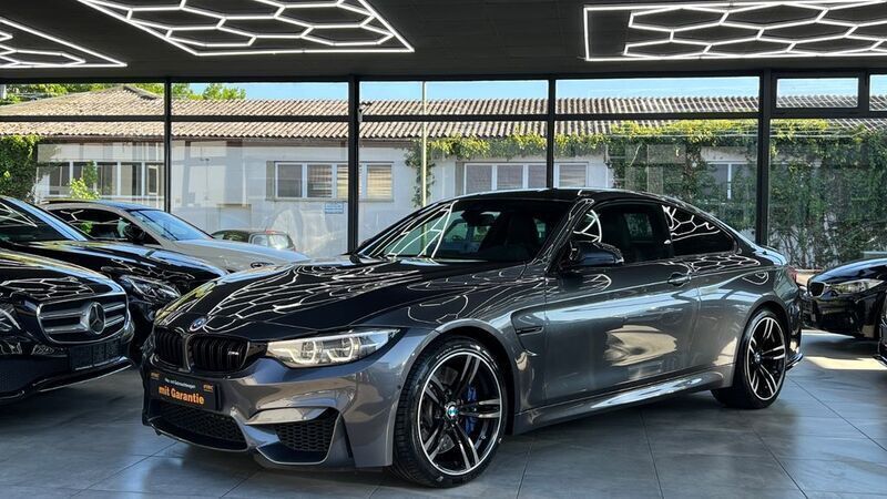 Grau Gebraucht 2019 BMW M4 Shadowline Coupé | 53.950 € (Guter Preis) - Bild 1/4