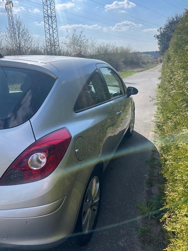 Second-hand Opel Corsa 87 CP (63 kW) 2013 Argintiu Hatchback
