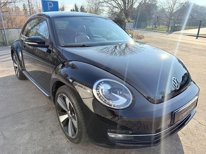 Gebraucht VW Beetle Exclusive 105 PS (77 kW) 2014 Schwarz Kleinwagen