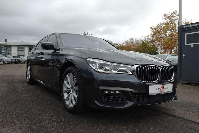 Grau Gebraucht 2016 BMW 750 M Sport Limousine | 28.900 € (Guter Preis) - Bild 1/4