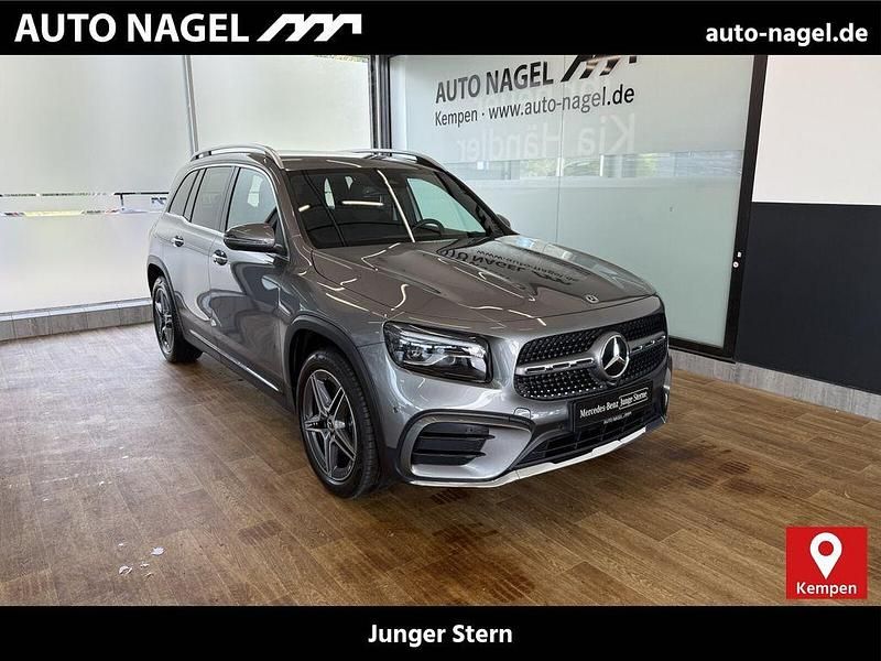 Mountaingrau Gebraucht 2024 Mercedes GLB200 AMG SUV | 41.576 € (Fairer Preis) - Bild 1/4
