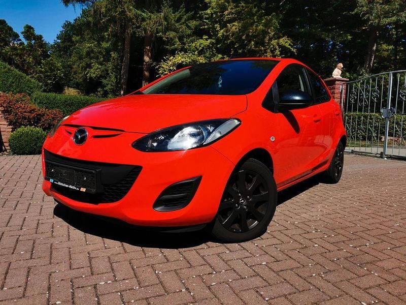 Rot Gebraucht 2013 Mazda 2 Edition Limousine | 6.400 € (Fairer Preis) - Bild 1/4
