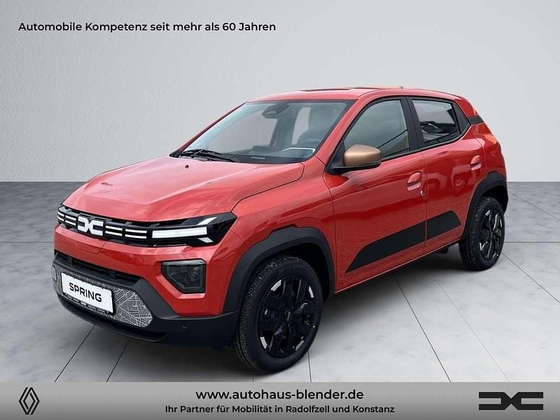 Brick red Neu 2025 Dacia Spring Extreme Kleinwagen | 17.990 € (Guter Preis) - Bild 1/4