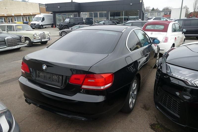 Second-hand BMW 325 Sport Line 218 CP (160 kW) 2006 Negru Coupe
