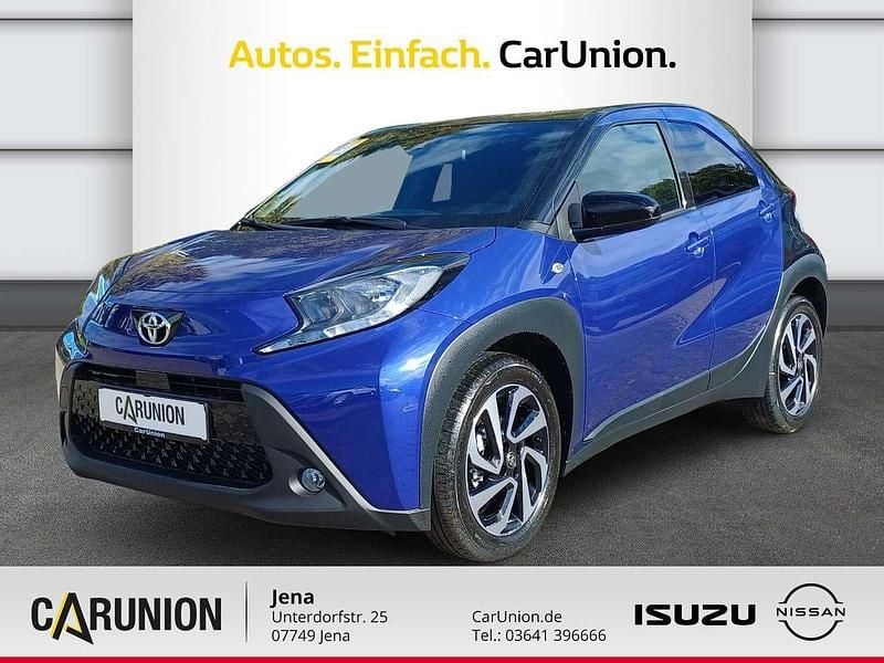 Juniper blue (8y8)/ black mica Gebraucht 2026 Toyota Aygo X SUV | 16.990 € (Fairer Preis) - Bild 1/4