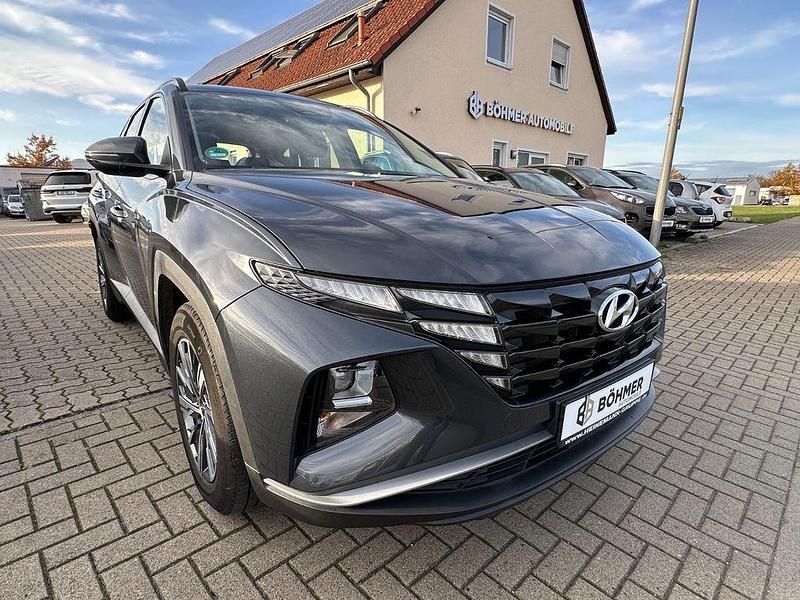 Grau Gebraucht 2021 Hyundai Tucson Prime SUV | 22.900 € (Fairer Preis) - Bild 1/4