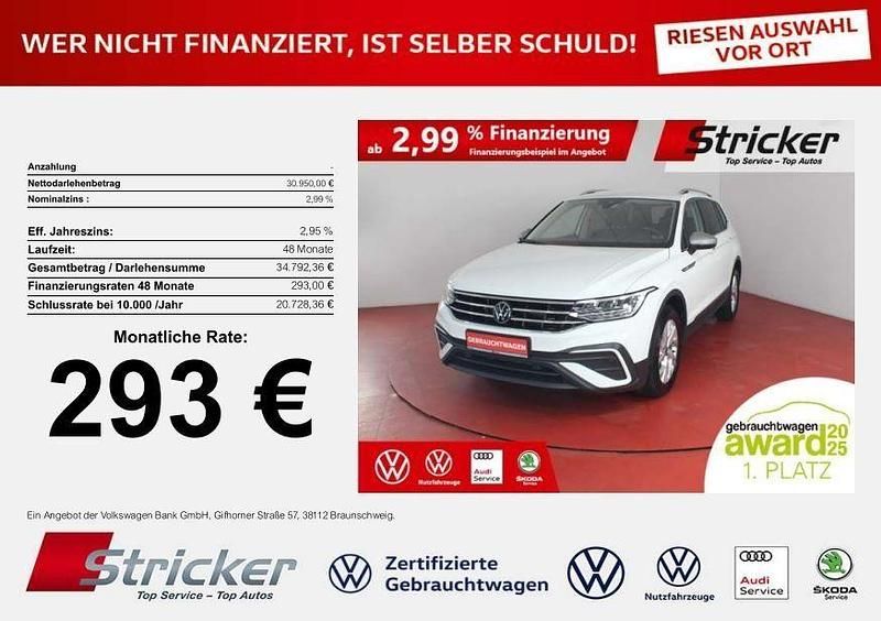 Weiß (pure white) Gebraucht 2024 VW Tiguan Allspace Life SUV | 30.868 € (Superpreis) - Bild 1/4