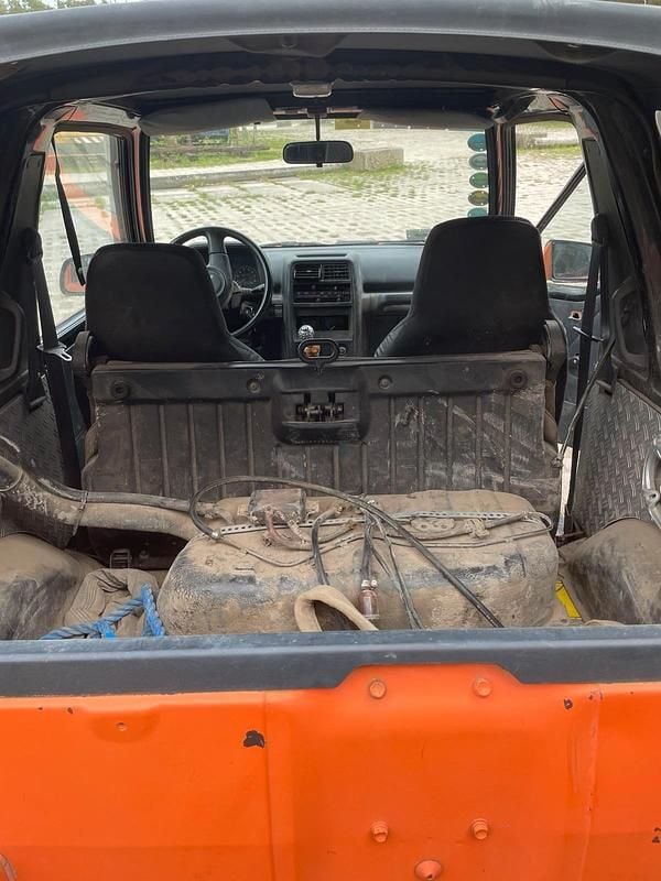 Second-hand Suzuki Vitara 98 CP (72 kW) 1987 Portocaliu Cabrio