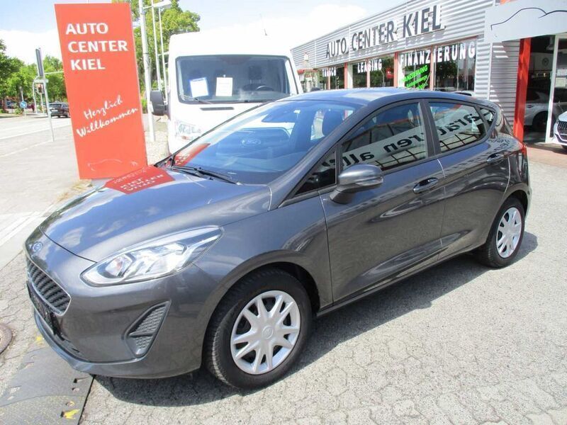Grau (metallic) Gebraucht 2018 Ford Fiesta Trend Kleinwagen | 9.650 € (Fairer Preis) - Bild 1/4