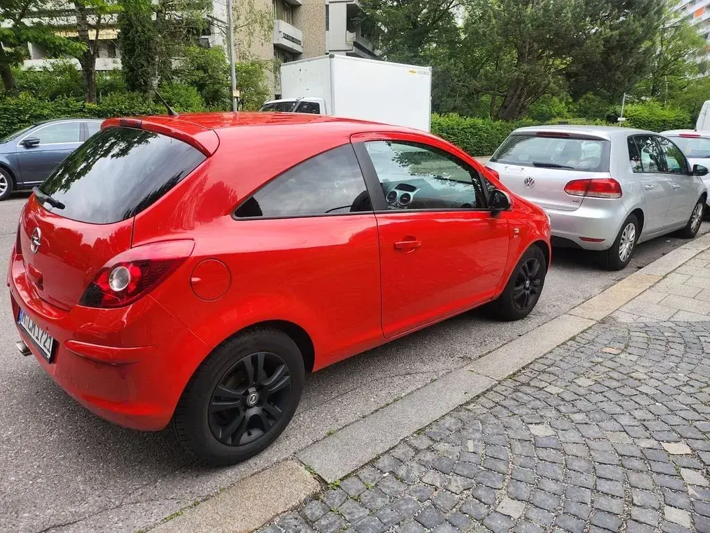 Gebraucht Opel Corsa Color Edition 101 PS (74 kW) 2011 Rot Kleinwagen