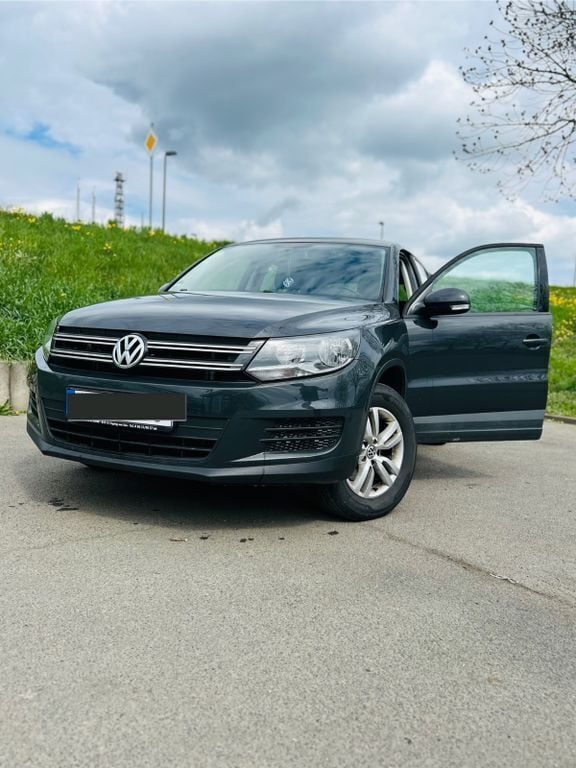 Grau Gebraucht 2014 VW Tiguan Trendline SUV | 9.200 € (Fairer Preis) - Bild 1/4