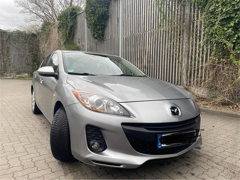 Second-hand Mazda 3 105 CP (77 kW) 2012 Argintiu Berlinǎ