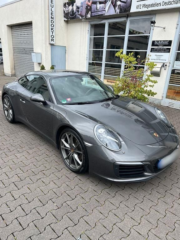 Grau Gebraucht 2018 Porsche 911 Carrera Coupé | 79.900 € (Superpreis) - Bild 1/4