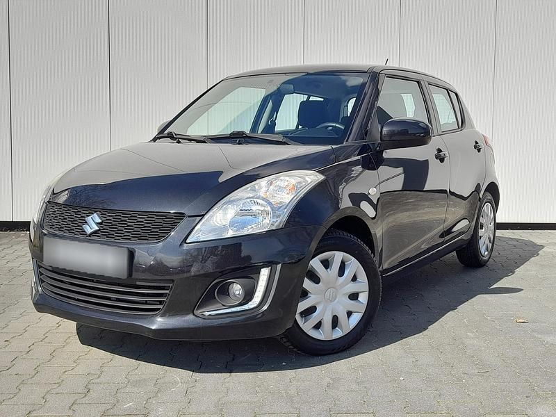Schwarz metallic Gebraucht 2014 Suzuki Swift Club | 8.560 € (Teuer) - Bild 1/4