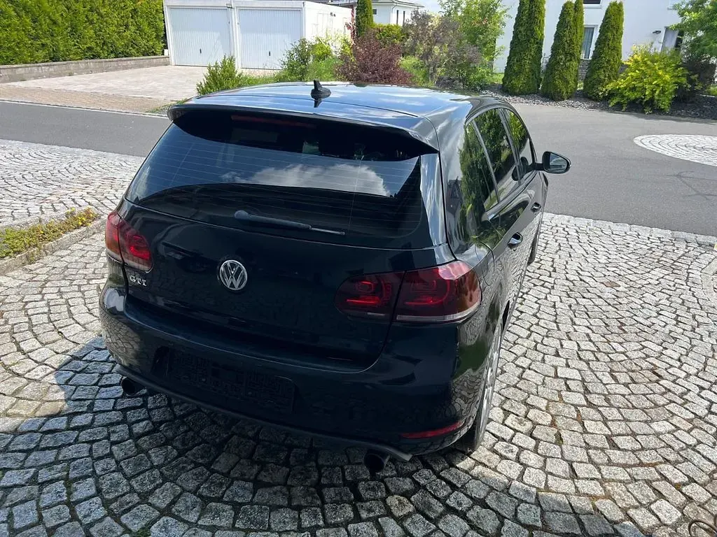 Second-hand VW Golf VII GTI 211 CP (155 kW) 2013 Negru Berlinǎ
