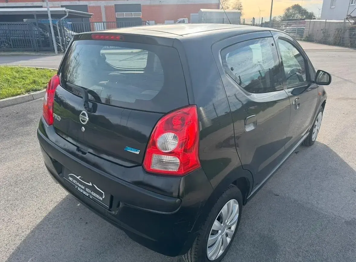 Gebraucht Nissan Pixo Acenta 69 PS (50 kW) 2010 Schwarz Kleinwagen