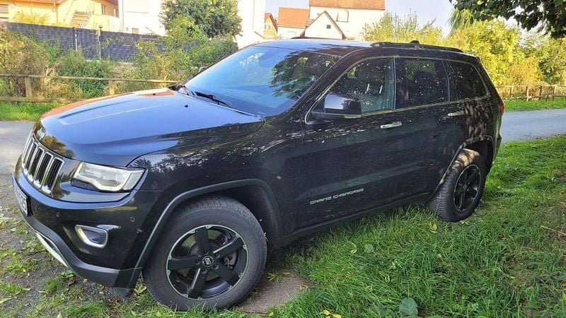 Schwarz Gebraucht 2016 Jeep Grand Cherokee SUV | 18.499 € (Superpreis) - Bild 1/4