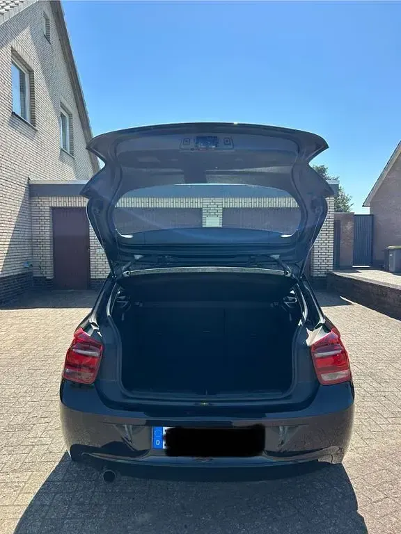 Gebraucht BMW 116 116 PS (85 kW) 2012 Schwarz Kleinwagen