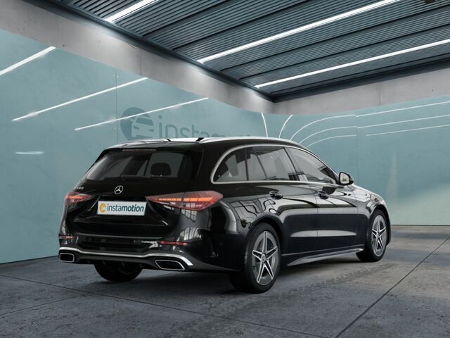 Schwarz Gebraucht 2022 Mercedes C180 AMG Kombi | 37.445 € - Bild 1/2
