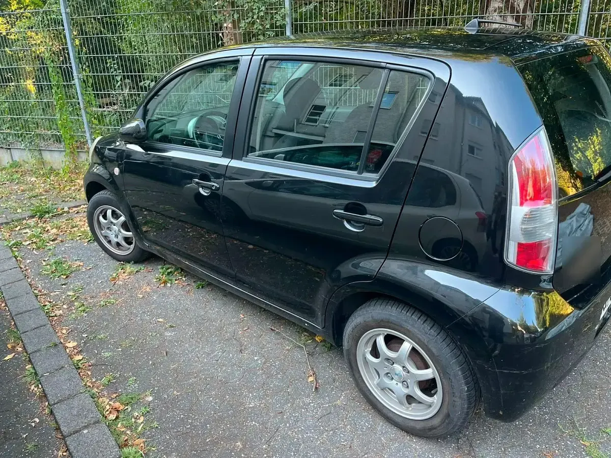 Gebraucht Daihatsu Sirion 69 PS (50 kW) 2006 Schwarz Kleinwagen