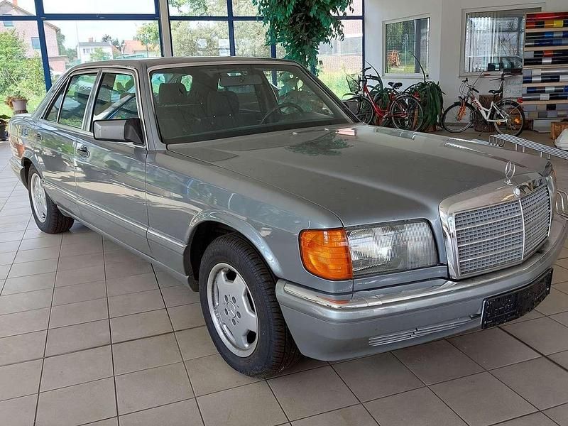 Perlmuttgrau Gebraucht 1987 Mercedes S300 SE Limousine | 13.990 € - Bild 1/4