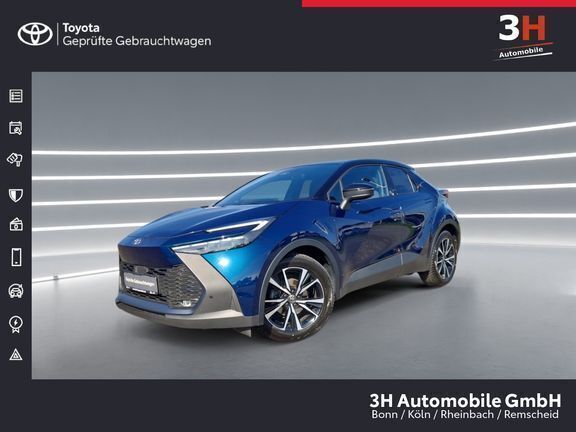 Midnight teal metallic/ dach schwarz Gebraucht 2024 Toyota C-HR Team SUV | 30.990 € (Etwas zu teuer) - Bild 1/4