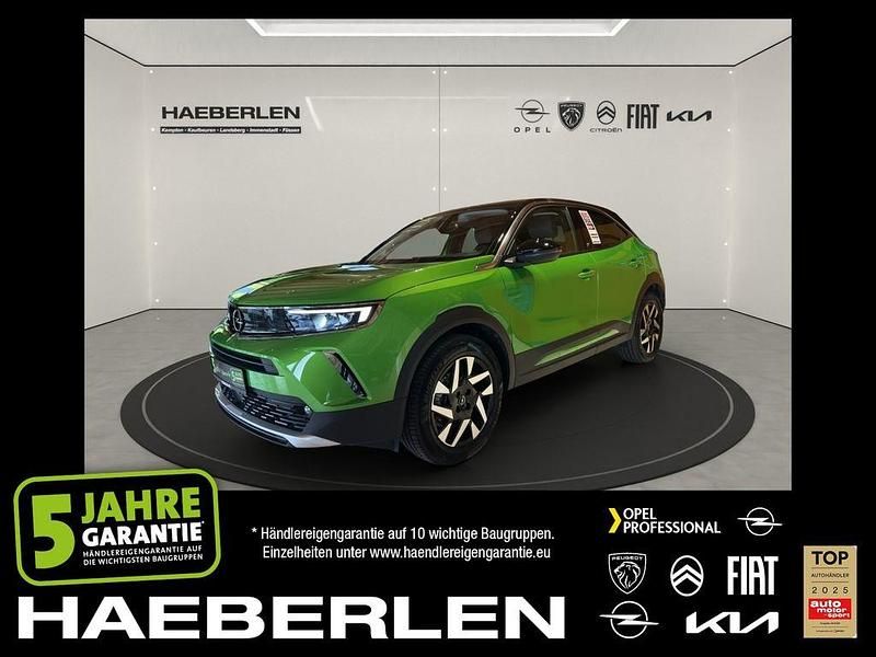Matcha grün (metallic) Gebraucht 2021 Opel Mokka-e Elegance SUV | 15.980 € (Guter Preis) - Bild 1/4