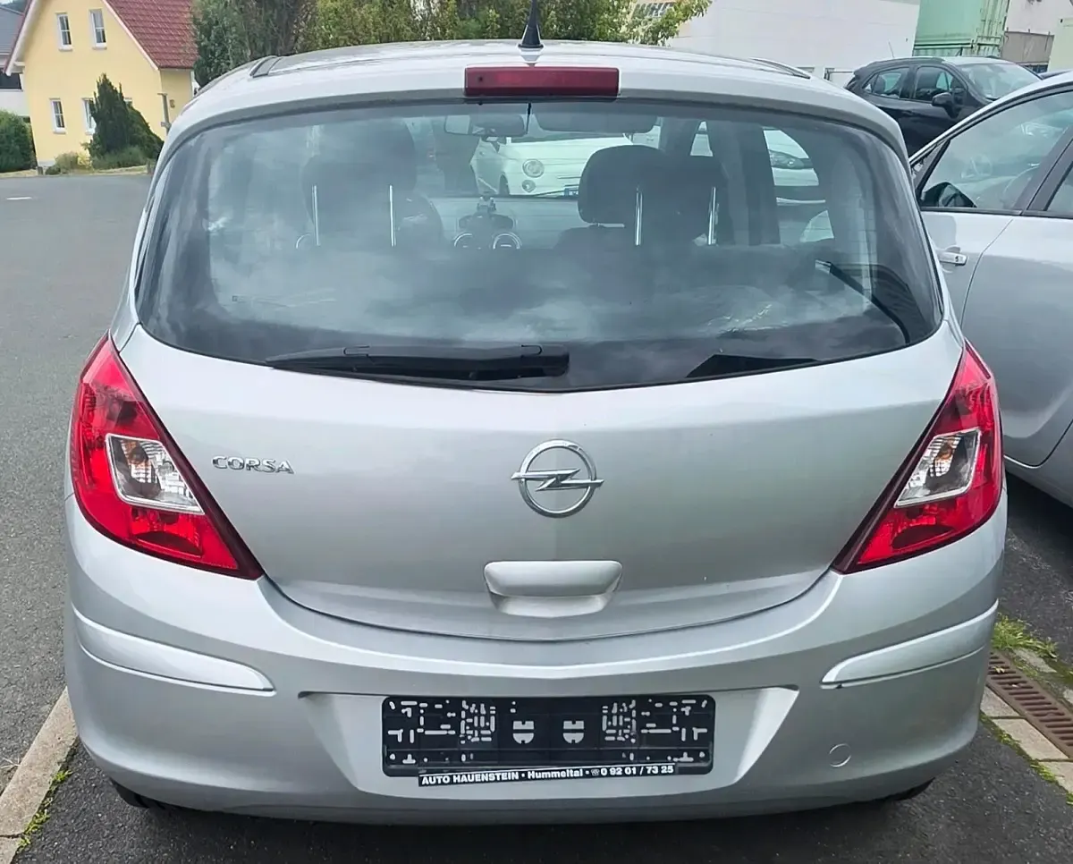 Gebraucht Opel Corsa 75 PS (55 kW) 2014 Silber Kleinwagen