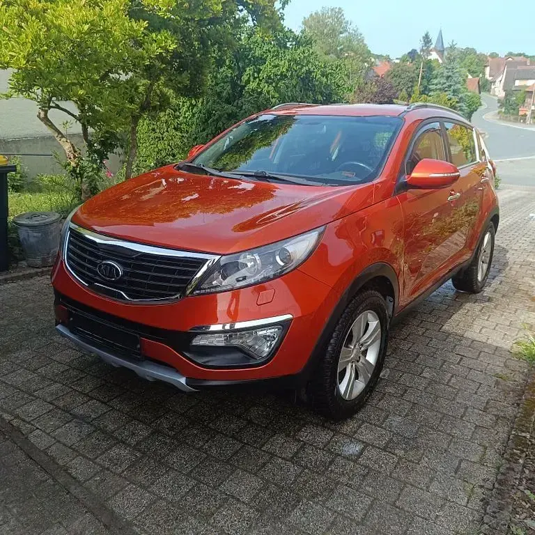 Gebraucht Kia Sportage Vision 163 PS (119 kW) 2012 Orange SUV