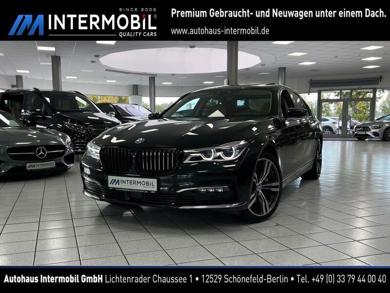 Black sapphire metallic Gebraucht 2018 BMW 740 Limousine | 39.990 € (Fairer Preis) - Bild 1/4