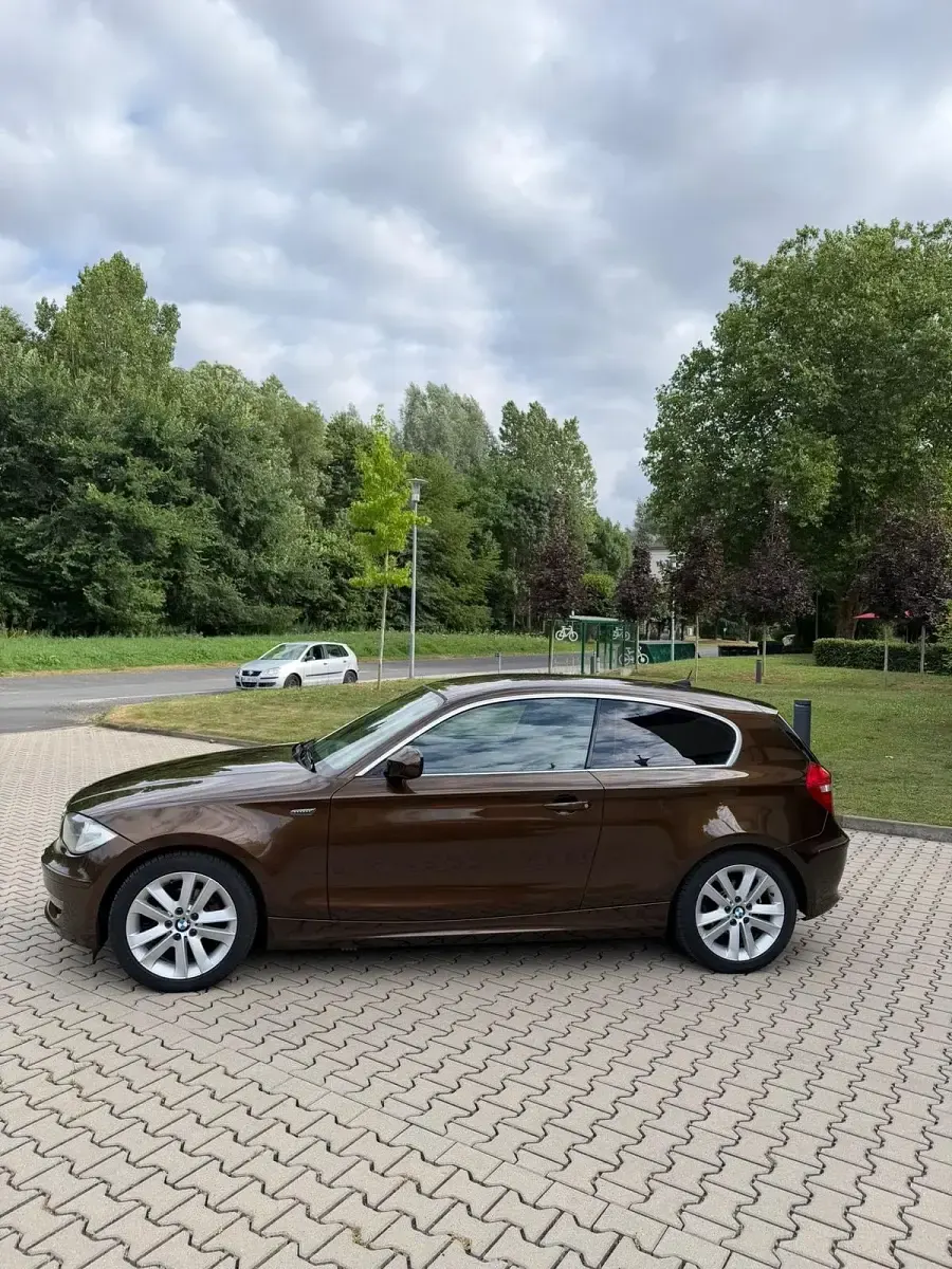 Gebraucht BMW 116 122 PS (89 kW) 2010 Braun Kleinwagen