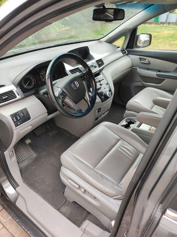 Gebraucht 2011 Honda Odyssey Van / Kleinbus | 14.900 € - Bild 1/4