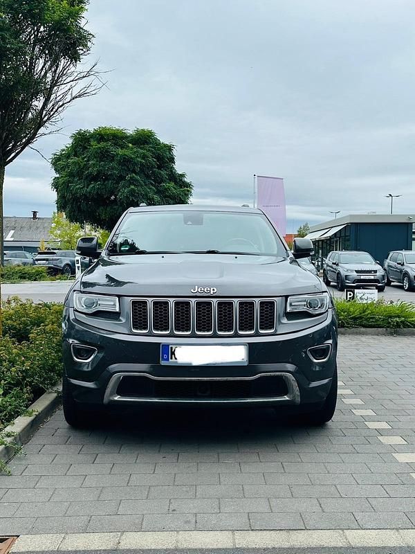 Grau Gebraucht 2013 Jeep Grand Cherokee Overland SUV | 9.500 € (Superpreis) - Bild 1/3