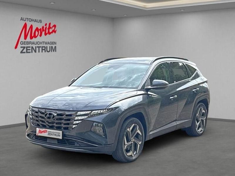 Dark knight / mic (metallic) Gebraucht 2021 Hyundai Tucson Prime SUV | 26.380 € (Fairer Preis) - Bild 1/4