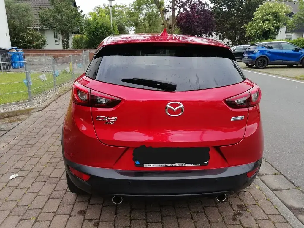 Używany Mazda CX-3 105 KM (77 kW) 2016 Czerwony SUV