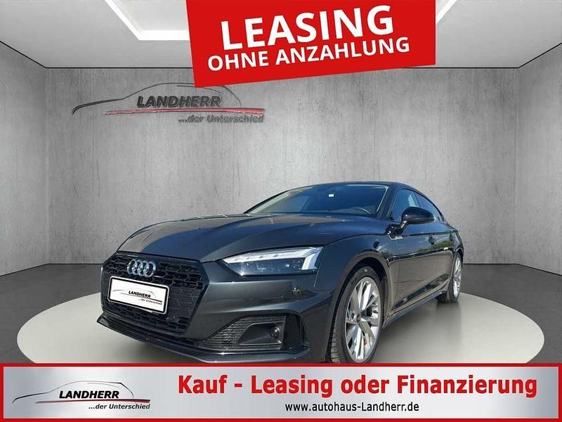 Grau Gebraucht 2024 Audi A5 Sportback Sport Limousine | 37.805 € (Superpreis) - Bild 1/4
