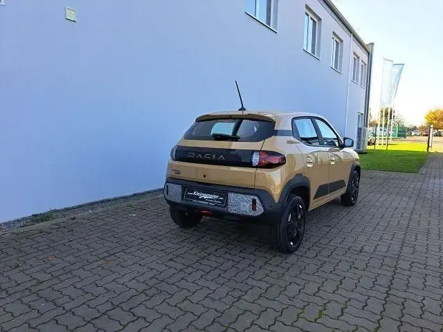 Gebraucht Dacia Spring Extreme 47 kW (65 PS) 2024 Beige Kleinwagen