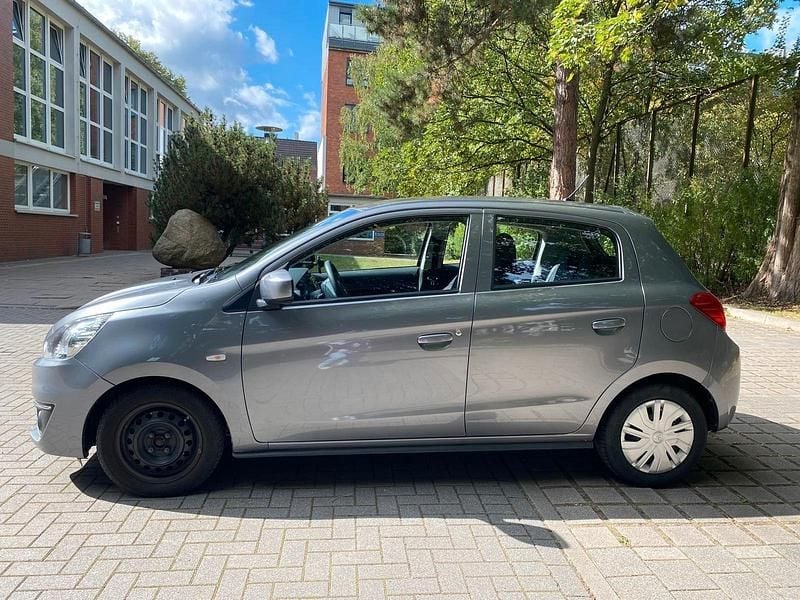 Grau Gebraucht 2019 Mitsubishi Space Star Kleinwagen | 7.100 € (Fairer Preis) - Bild 1/4