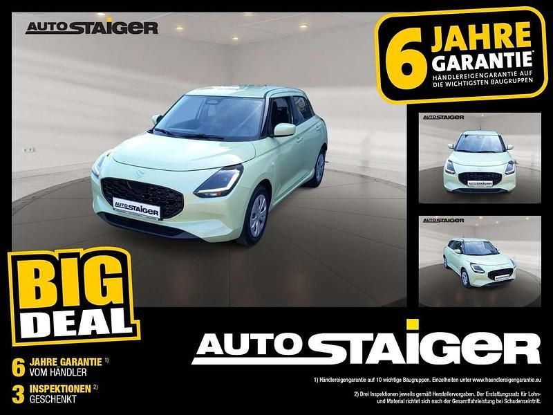 Cool yellow metallic Neu 2024 Suzuki Swift Club Kleinwagen | 14.690 € - Bild 1/4