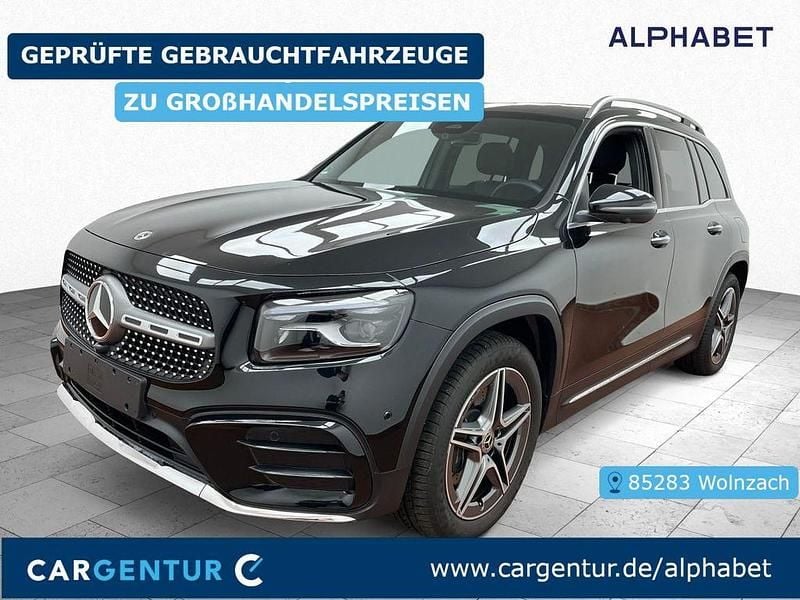 Kosmosschwarz lack (metallic) Gebraucht 2024 Mercedes GLB220 AMG SUV | 43.590 € (Superpreis) - Bild 1/2