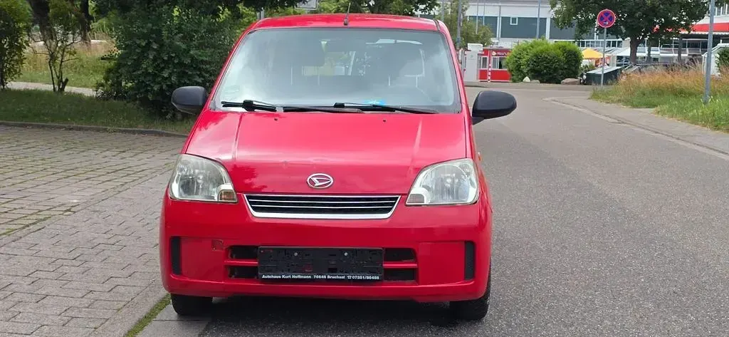 Gebraucht Daihatsu Cuore 58 PS (42 kW) 2005 Rot Kleinwagen