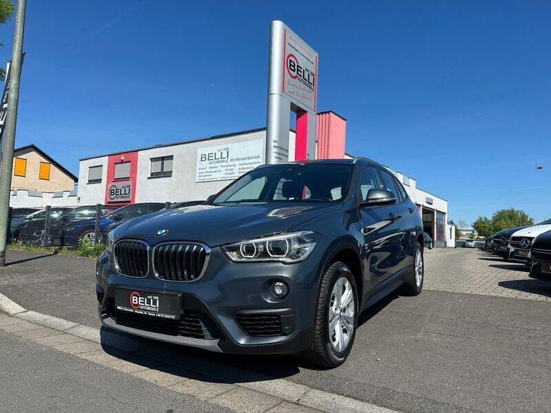 Atlantikgrau metallic Gebraucht 2016 BMW X1 Advantage SUV | 16.900 € (Fairer Preis) - Bild 1/4