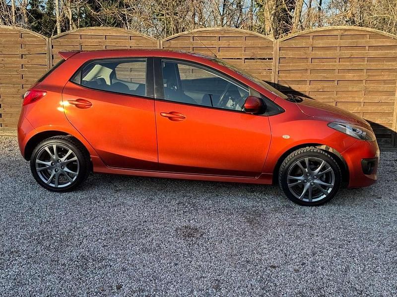 Gebraucht Mazda 2 Dynamic 103 PS (75 kW) 2009 Passion orange Kleinwagen