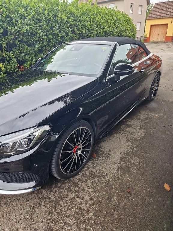 Schwarz Gebraucht 2017 Mercedes C180 AMG line Cabrio | 26.500 € (Fairer Preis) - Bild 1/4