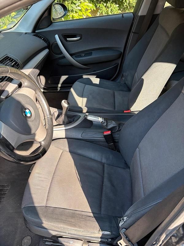 Second-hand BMW 116 115 CP (84 kW) 2006 Negru Hatchback