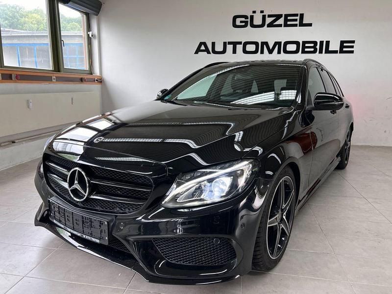 Schwarz Gebraucht 2018 Mercedes C250 AMG line Limousine | 20.980 € (Superpreis) - Bild 1/4