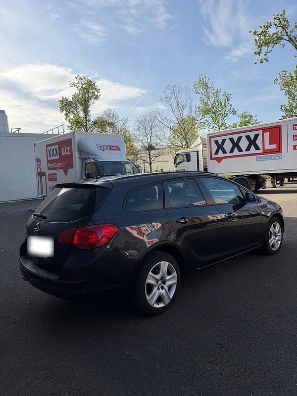 Gebraucht Opel Astra 120 PS (88 kW) 2011 Schwarz Kombi