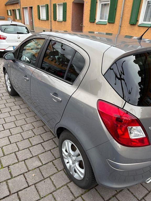 Gebraucht Opel Corsa Selection 87 PS (63 kW) 2011 Braun Kleinwagen