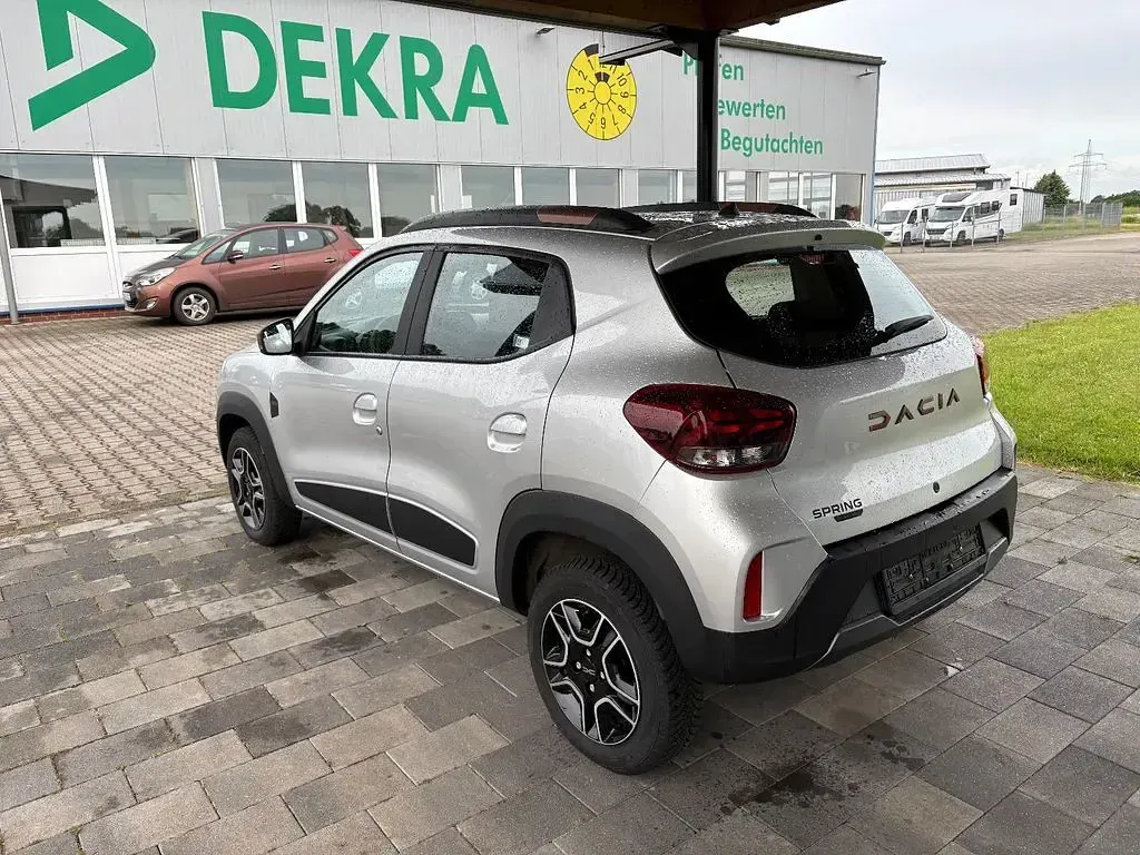Gebraucht Dacia Spring Extreme 47 kW (65 PS) 2023 Silber Kleinwagen