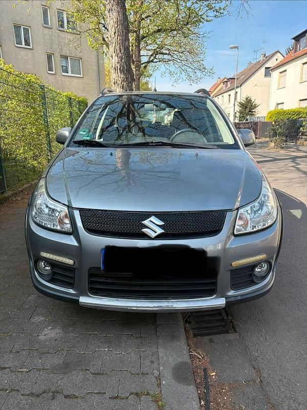 Usado Suzuki SX4 120 HP (88 kW) 2006 Cinzento Sedan